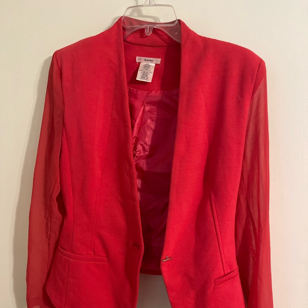 Hot pink blazer.